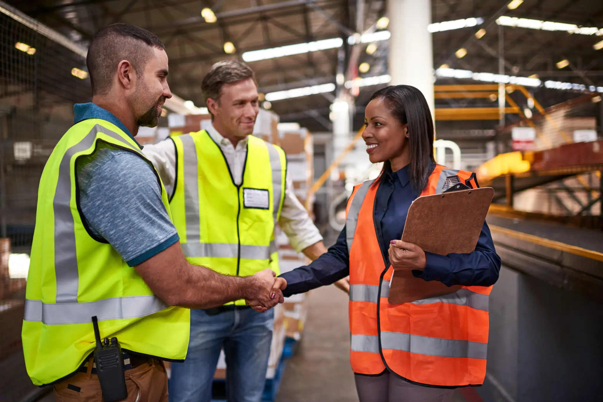 master safety professional working with certified safety experts in a warehouse