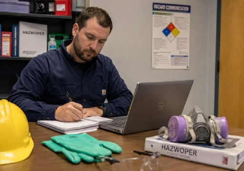 safety professional working on a computer for HAZWOPER online safety training